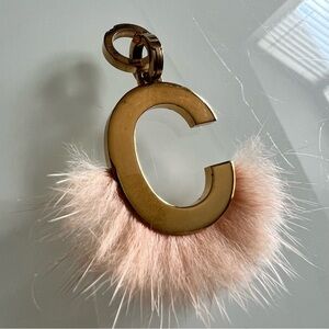Fendi | Gold toned “C” with real pink fur necklace purse charm Keyring